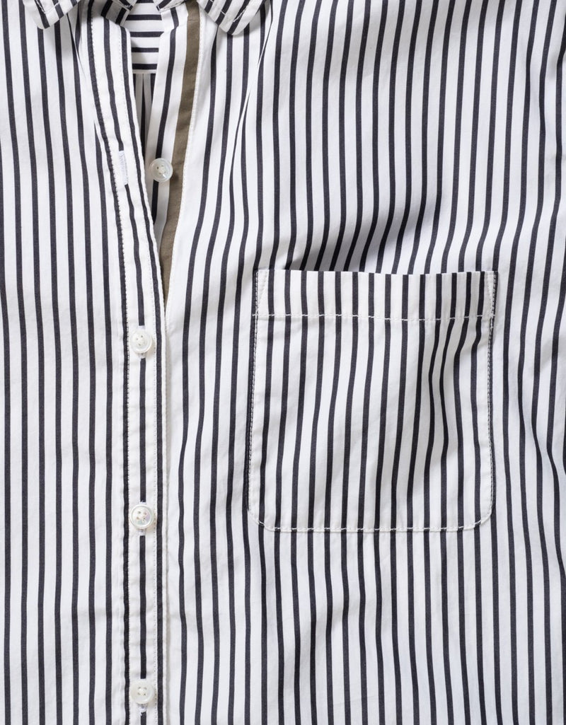 Close-up of a black and white button down shirt with chest pocket