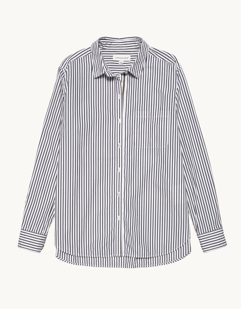 Black and white striped button down shirt on a light gray background