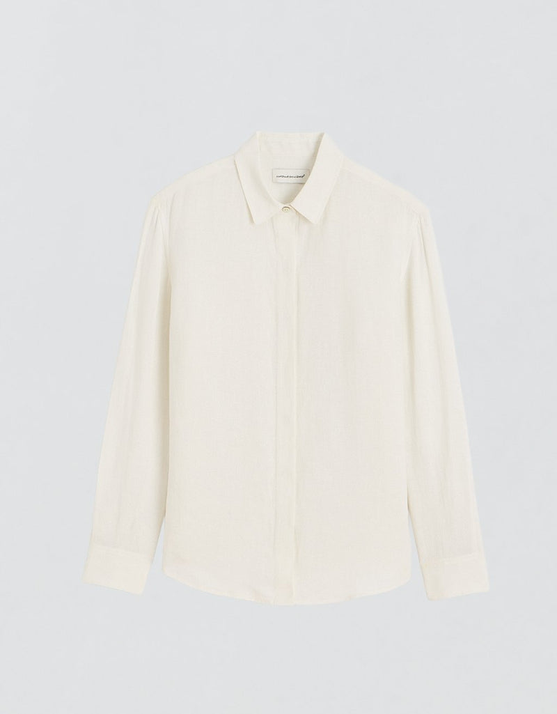 White button down shirt on a light gray background