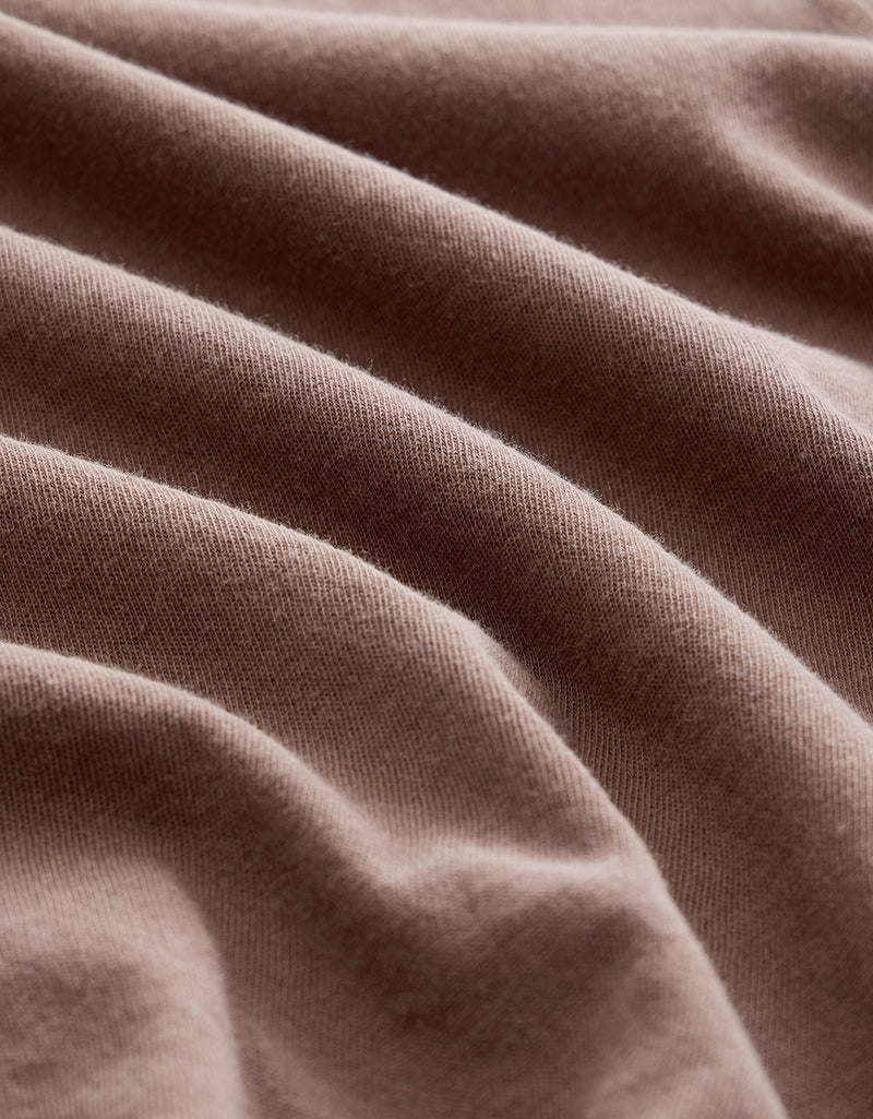 Close-up of brown fabric with visible texture