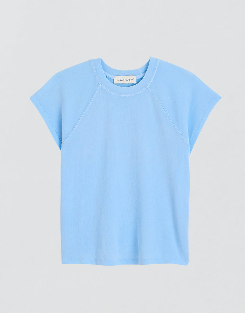 Light blue t-shirt on a light gray background