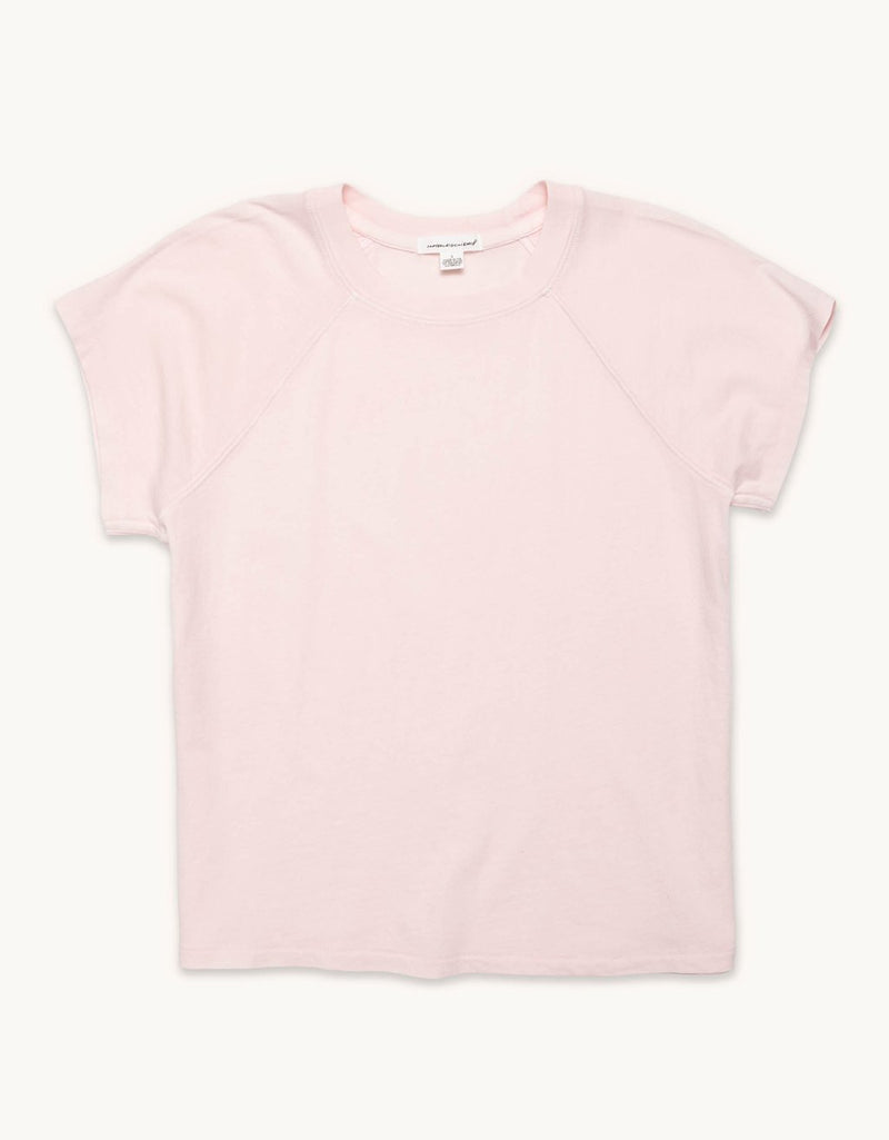 Pink t-shirt on a plain background