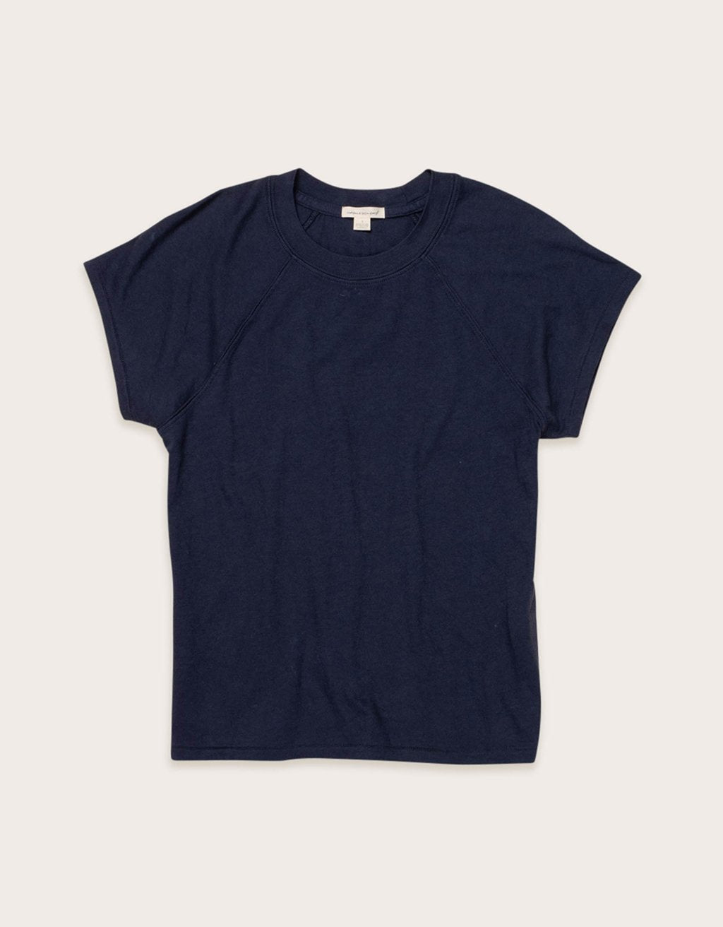 Navy blue raglan t-shirt on a light gray background