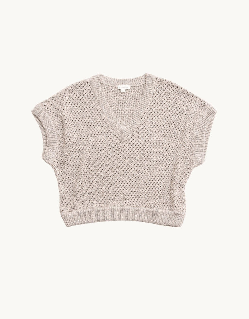 Silver open knit sweater on a plain background