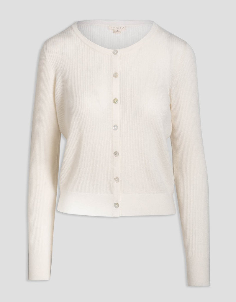 Ivory ribbed cashmere button down cardigan on a light gray background