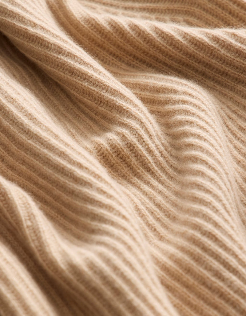 Close-up of camel cashmere fabric texture