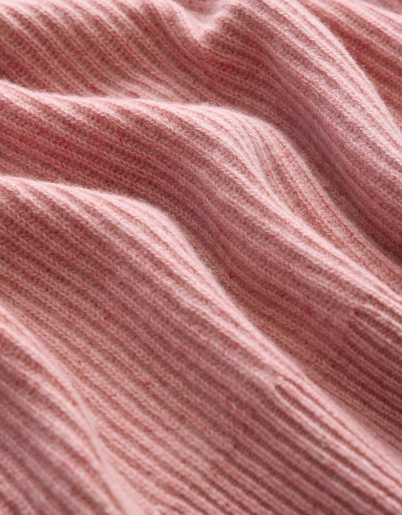 Close-up of pink cashmere fabric texture