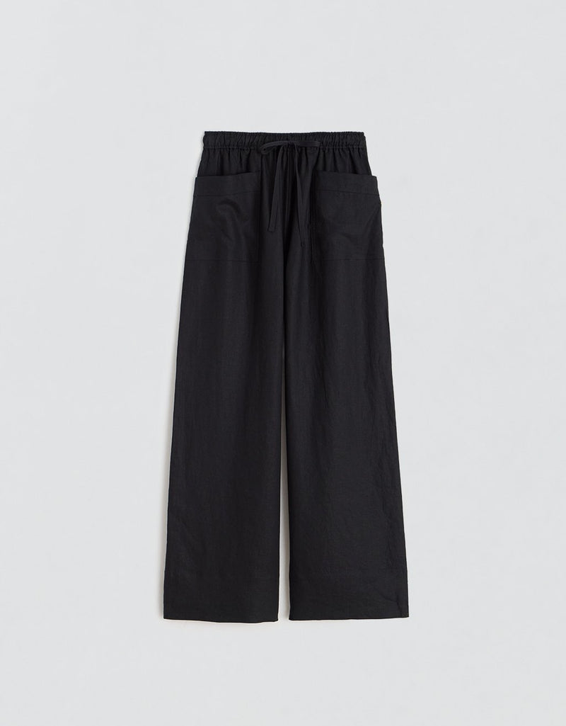 Black wide-leg pants with front pockets and a tie waistband on a light gray background