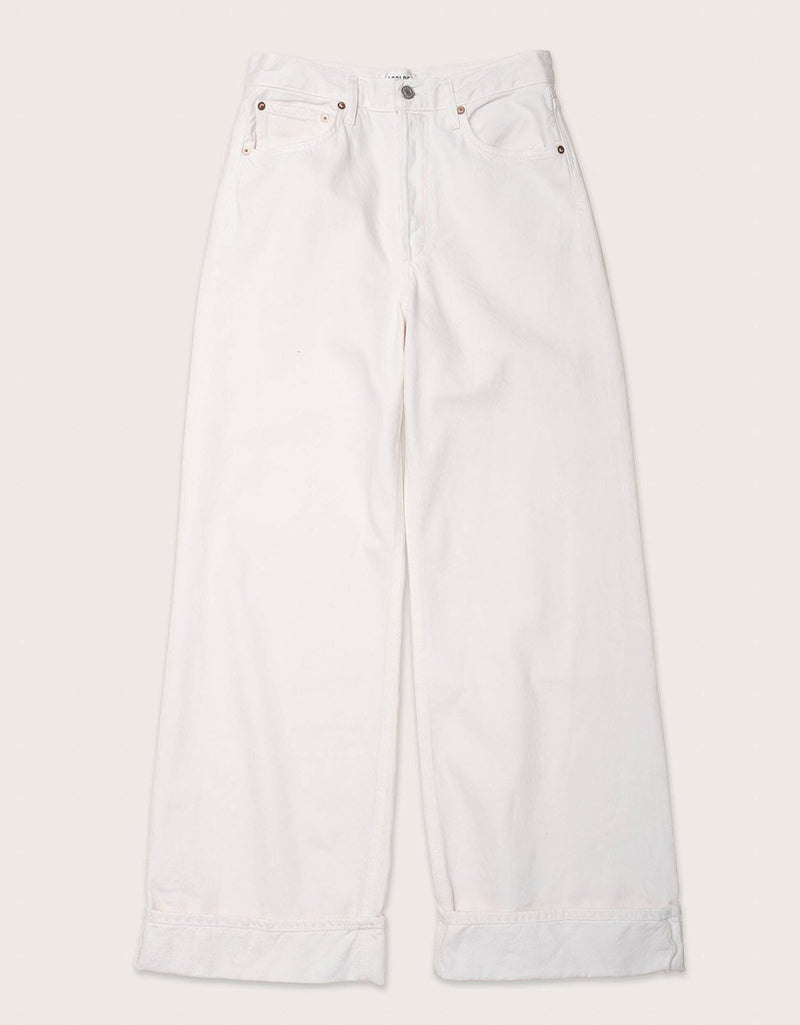 White wide leg jeans on a light beige background