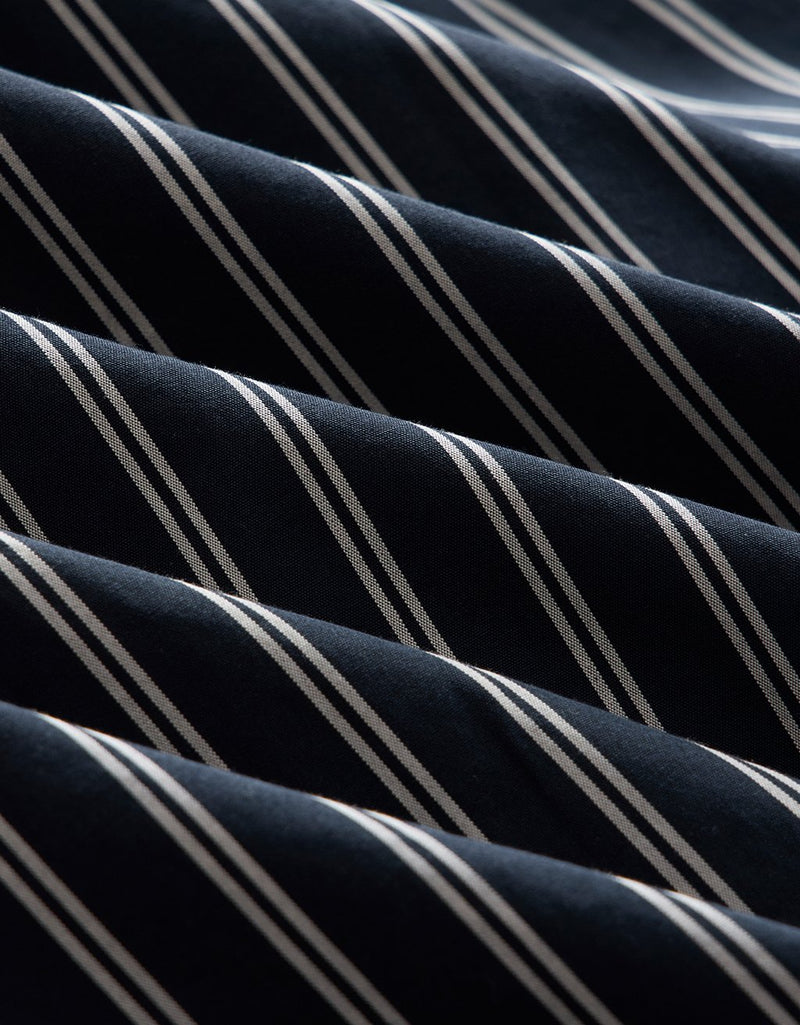 Close-up of navy fabric with white stripes
