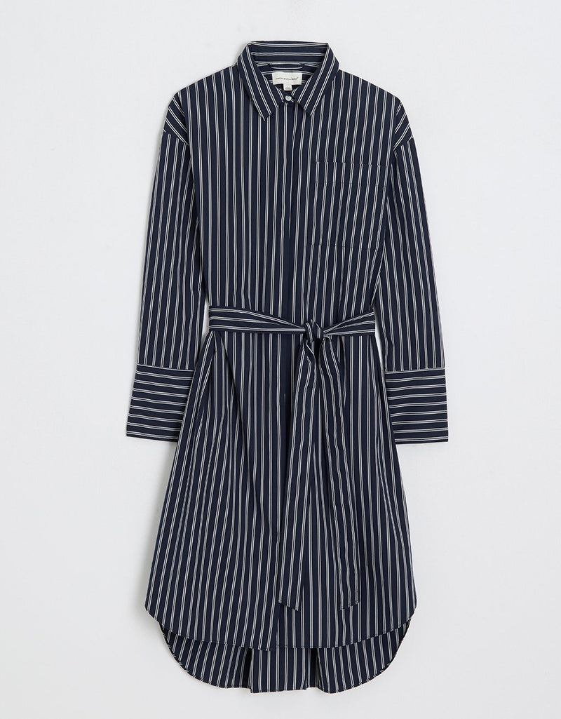 Navy and white striped shirtdress with a belt on a light gray background