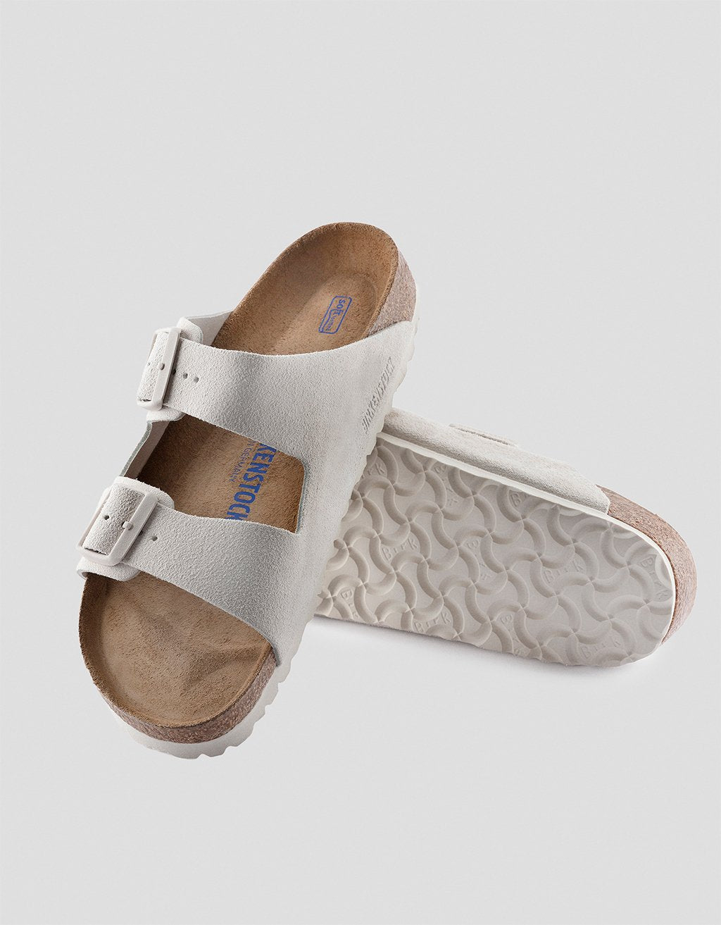 Pair of Birkenstock sandals on a light gray background