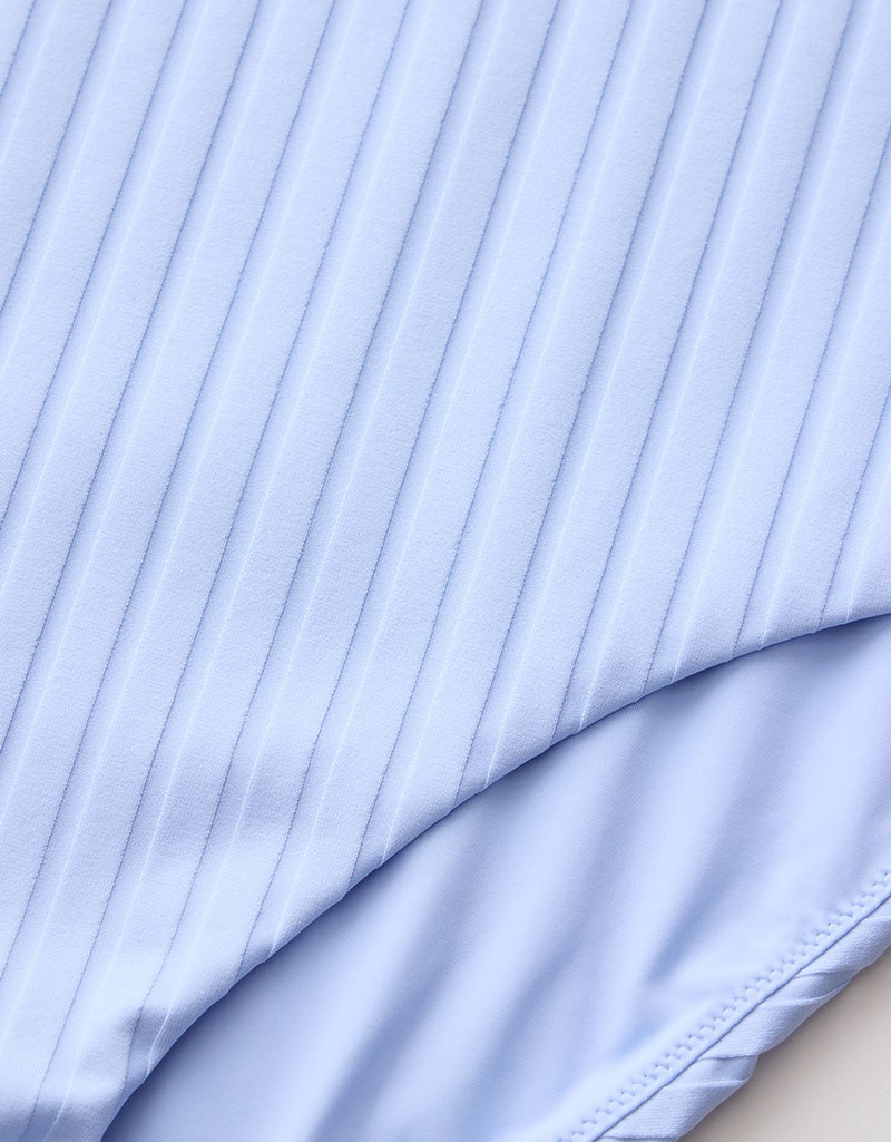 Close-up of light blue ribbed fabric