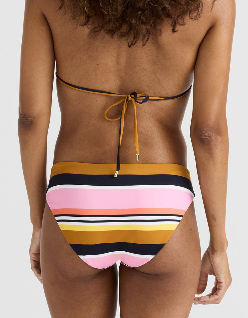 Multicolored striped bikini bottom on a plain background