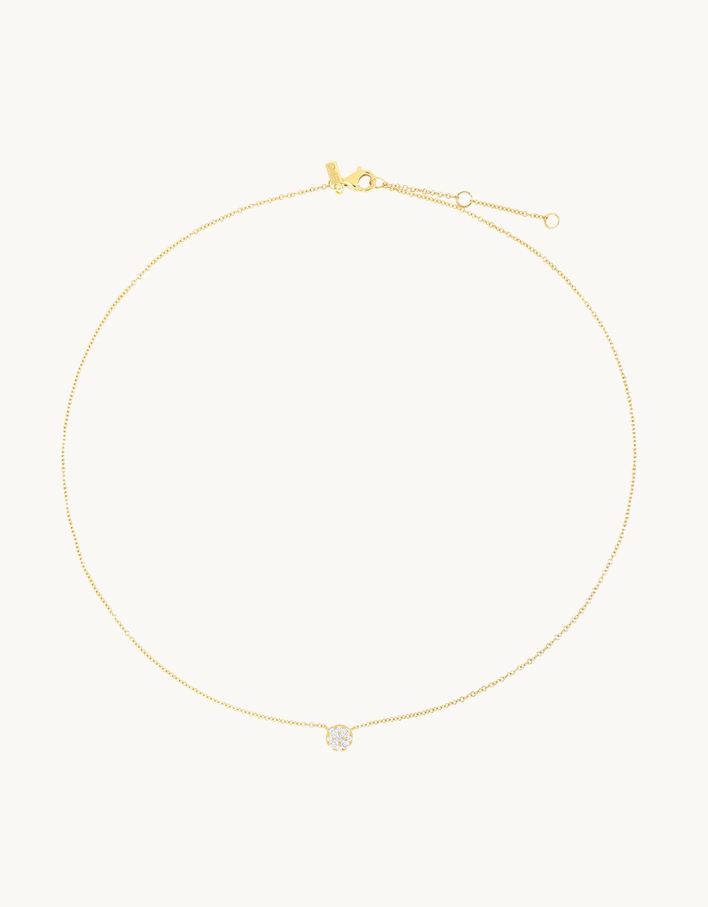 14k yellow gold necklace with a small diamond pendant on a light gray background