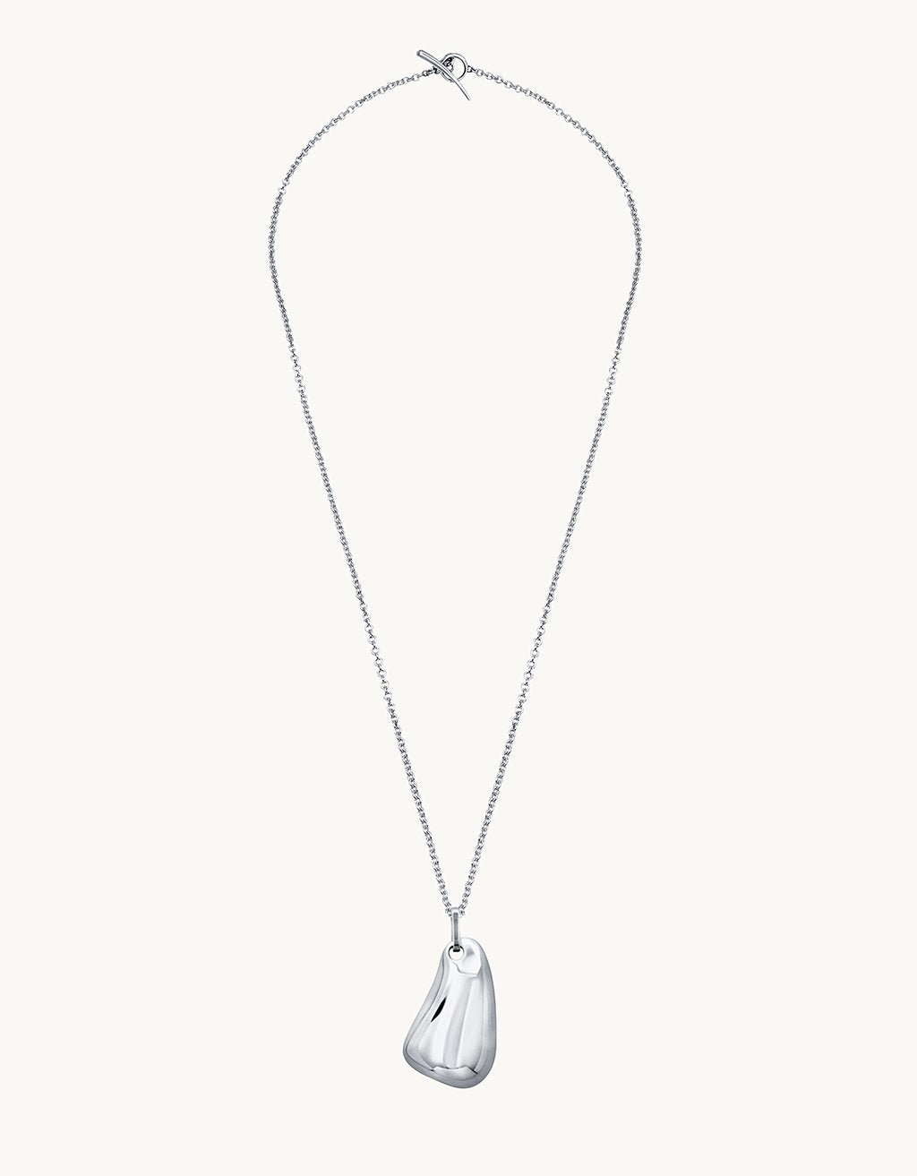 Silver necklace with a teardrop-shaped pendant on a plain background