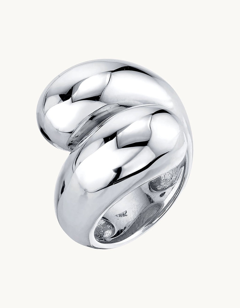 Silver structural double apse ring on a plain background