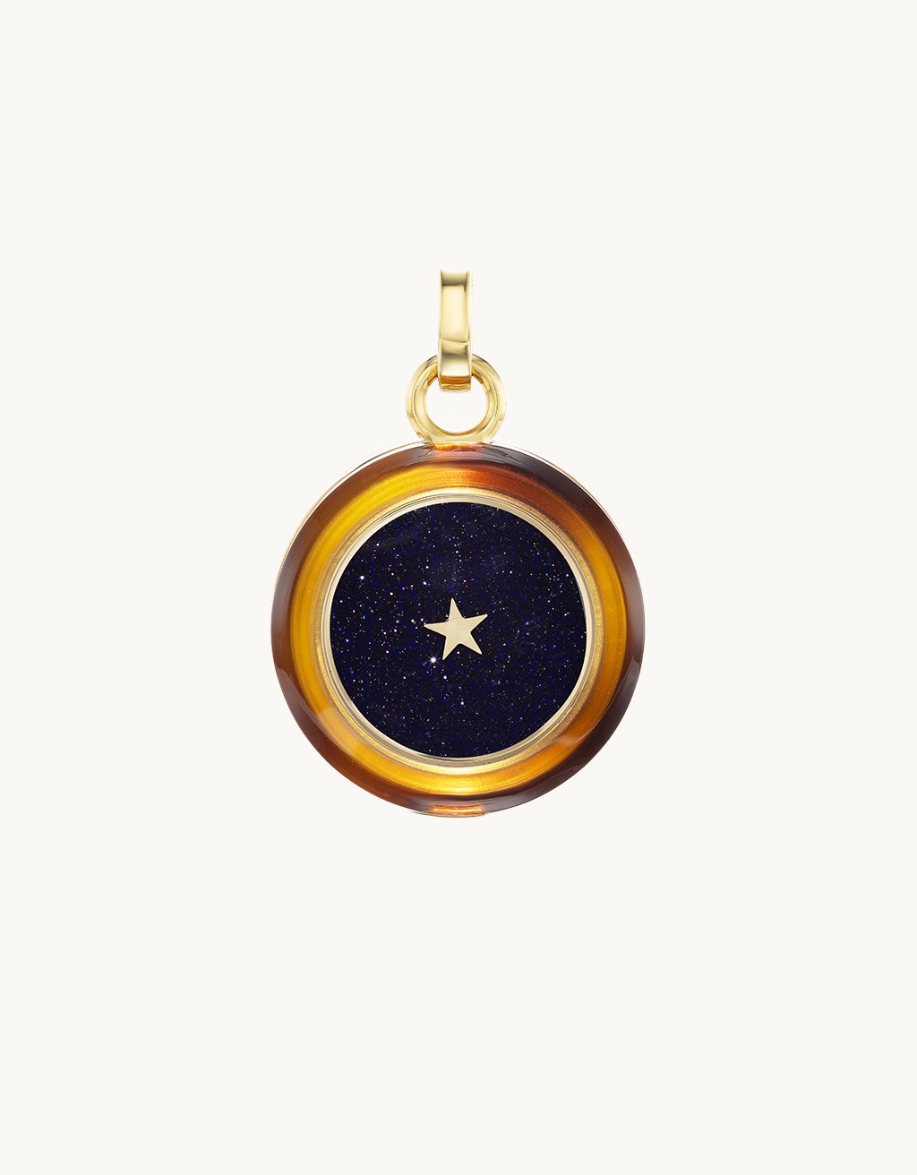 Pendant with a star design on a dark blue background, encased in a tortoiseshell-like frame.