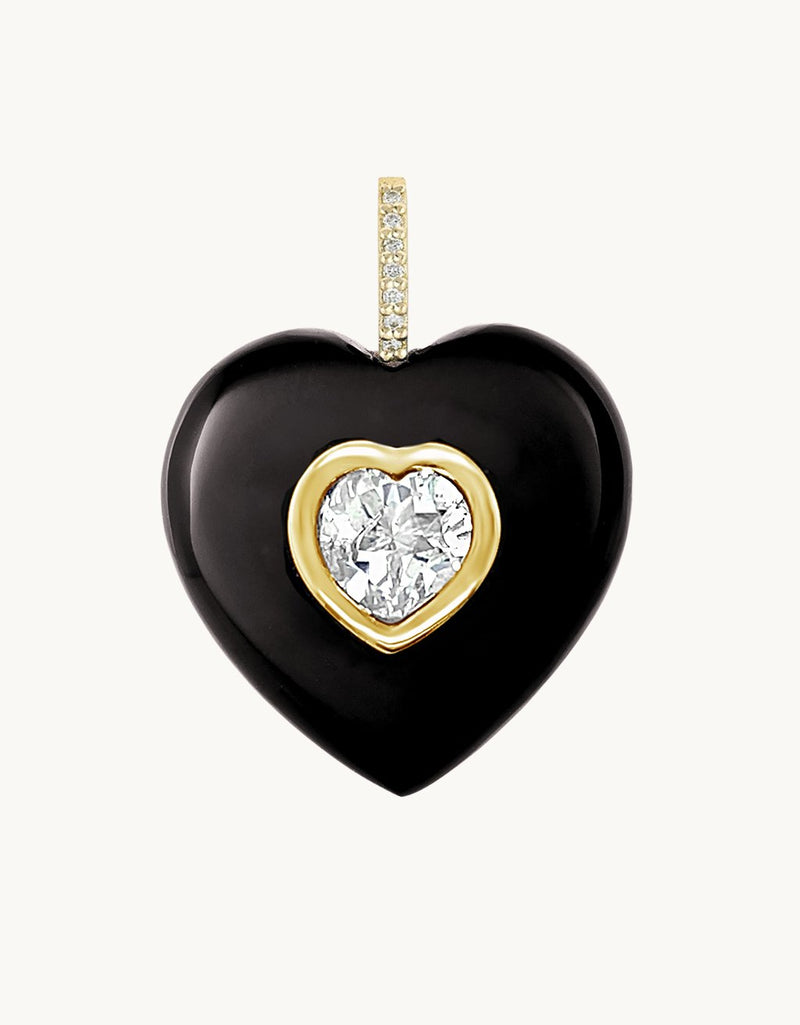 Heart-shaped Black Onyx pendant with a single center White Topaz stone and diamond bail on a light gray background
