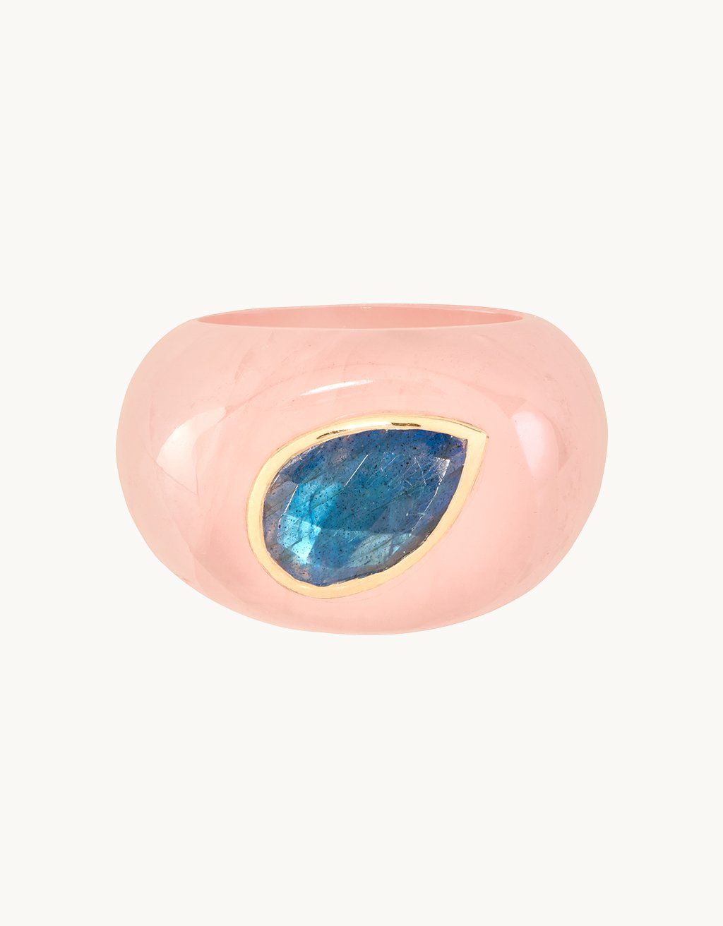 Rose Quartz ring featuring a Labradorite stone on a light gray background