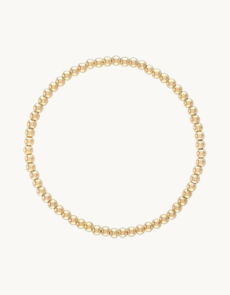 14k gold filled 3mm ball bracelet on a light gray background