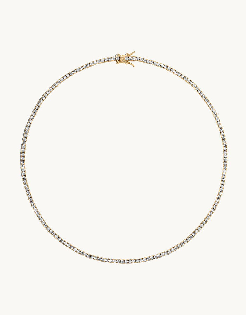 Crystal tennis necklace with box clasp closure on a light gray background