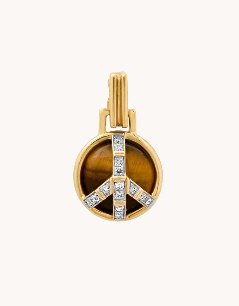 Gold peace sign pendant with a tiger's eye stone and diamond accents on a light gray background