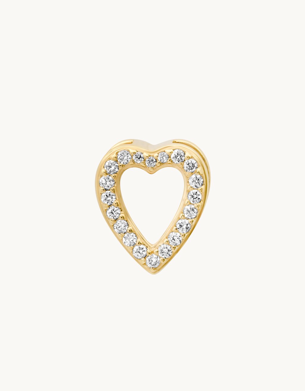 Gold heart-shaped charm with diamond accents on a plain background