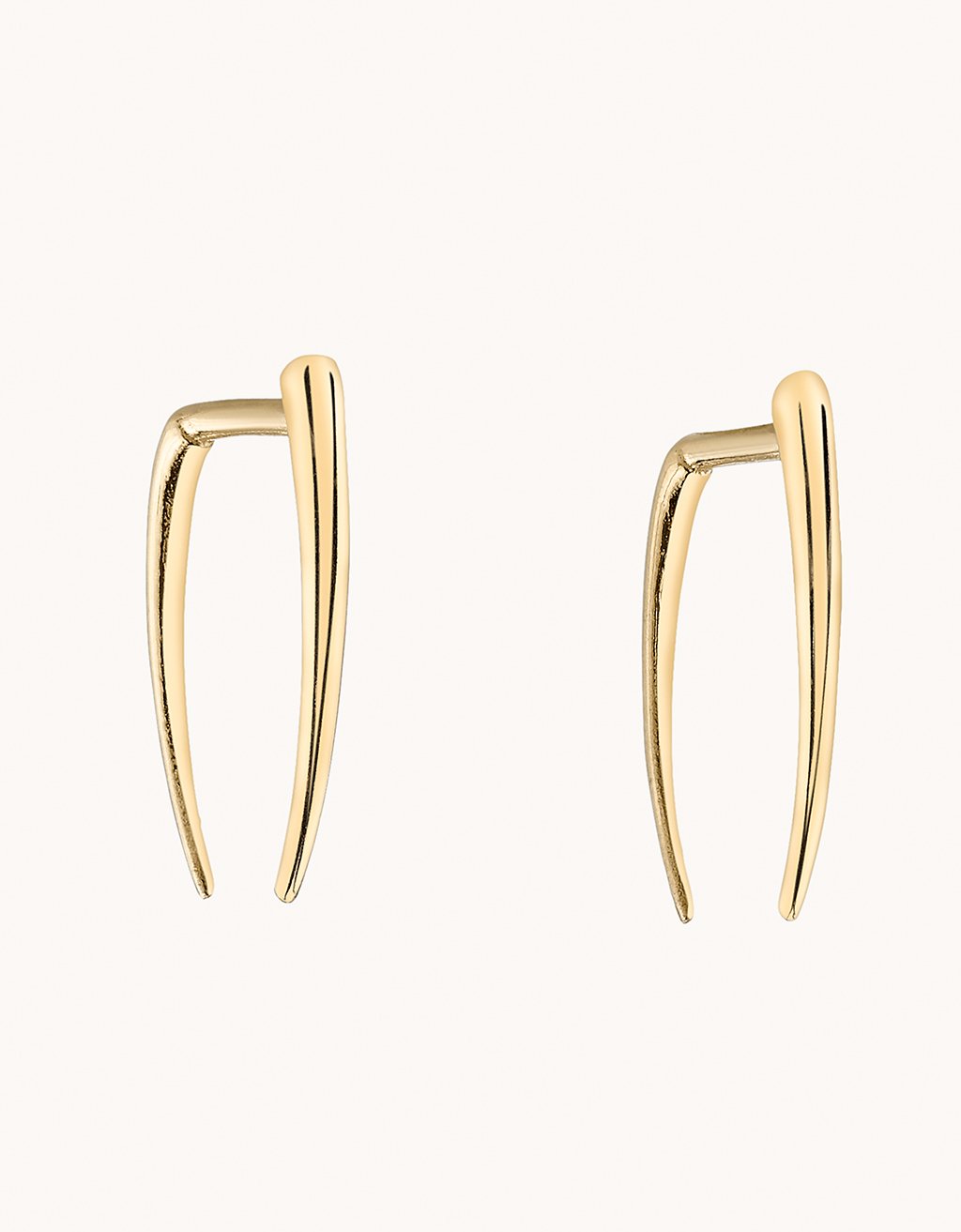 14k Yellow Gold earrings on a light gray background