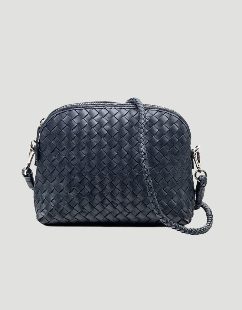 Navy woven handbag with detachable shoulder strap on a light gray background
