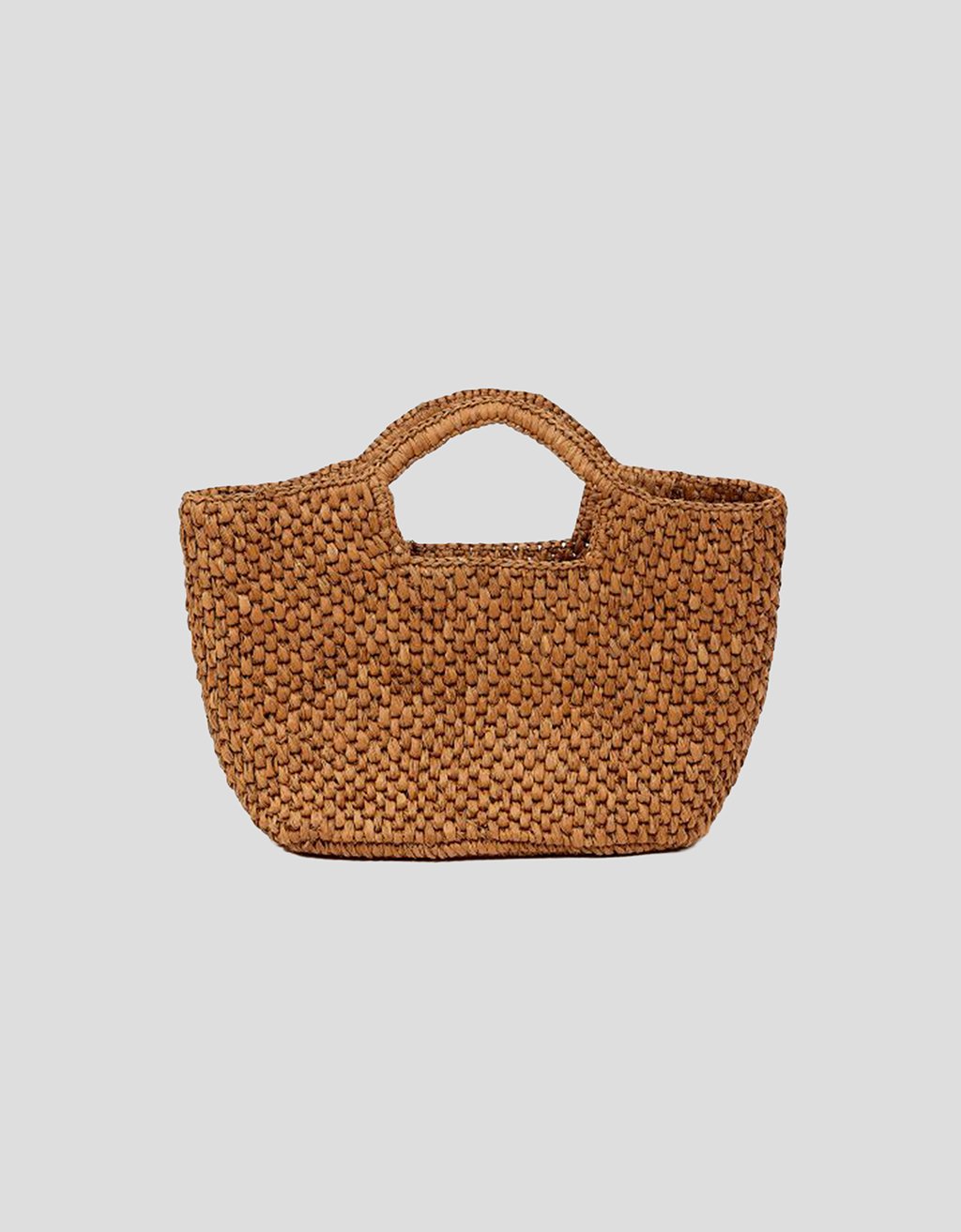 Woven raffia brown handbag with top handles on a light gray background