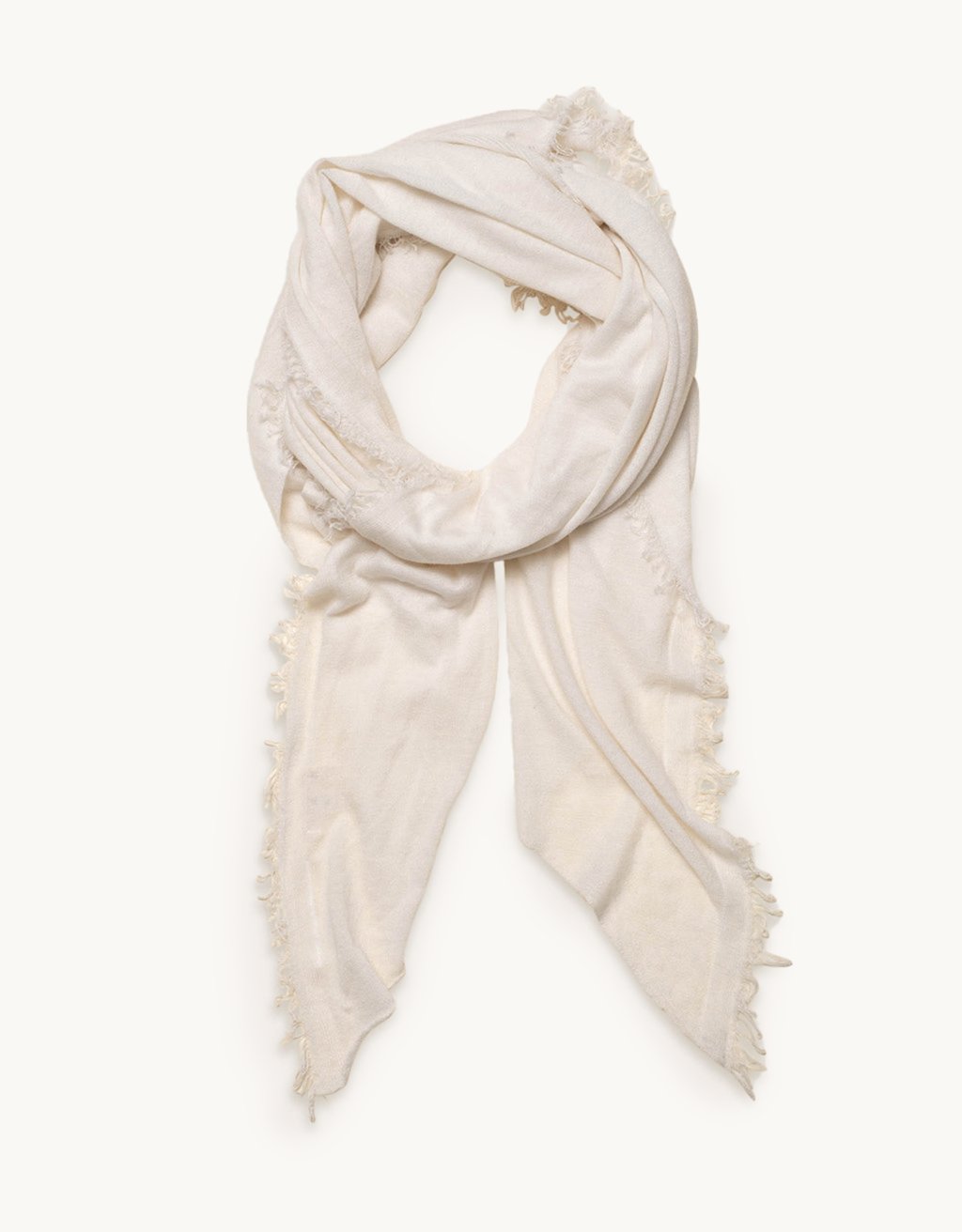 Ivory cashmere scarf with frayed details on a white background