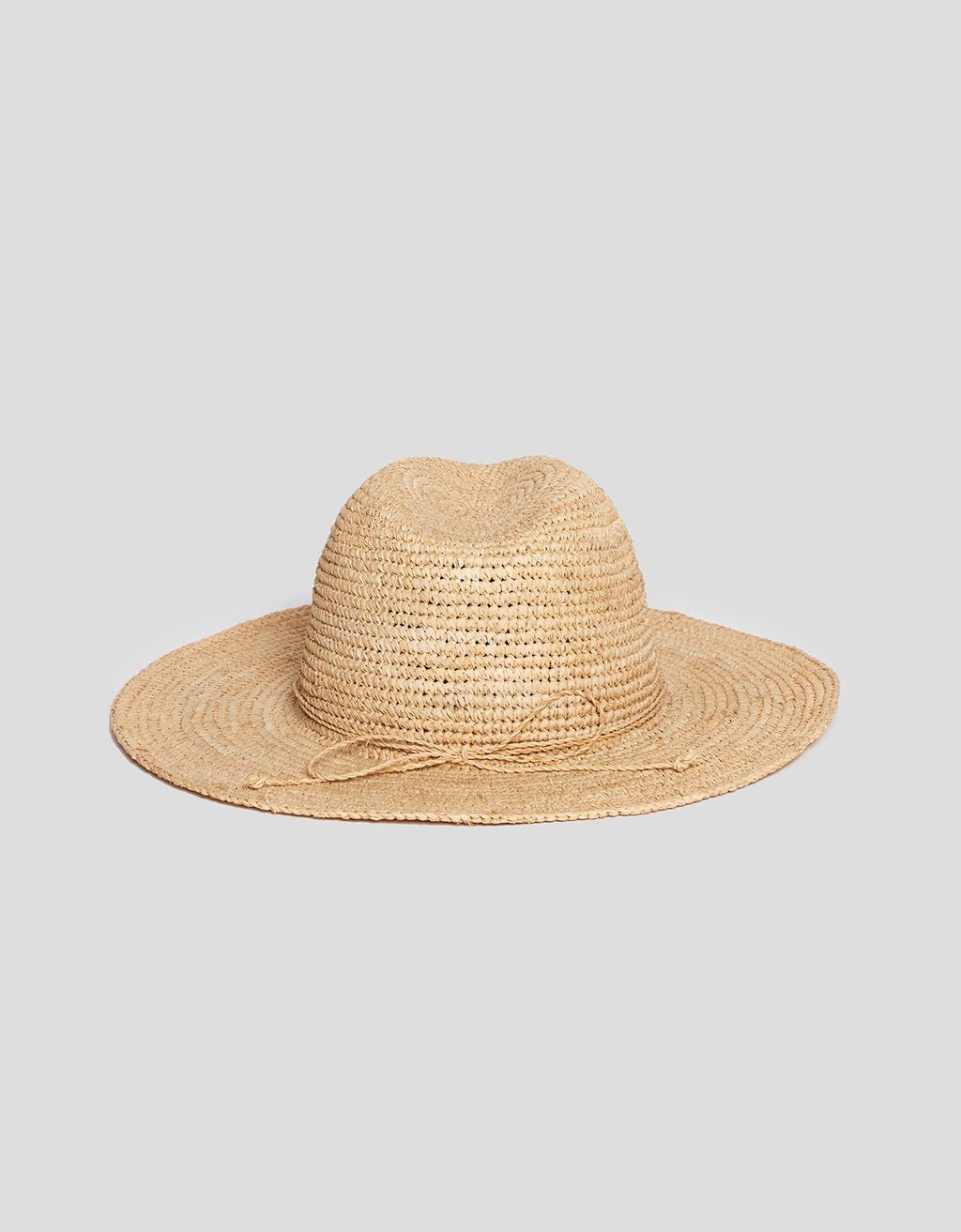 Beige straw hat on a light gray background